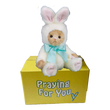 Babee Bunny Bear stuffed animal in a furry white costume sitting on a yellow box ready to be sent as a care package.  send a PRAYER : sendaprayernow.com